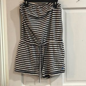 A strapless black and white romper